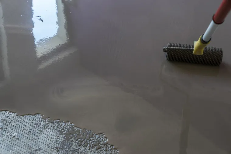 Chape de ravoirage utilisée pour un système de chauffage au sol, Annecy, Impoco Catania